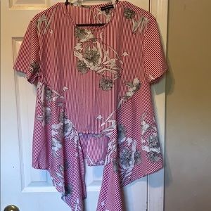 A red and white blouse with flowers